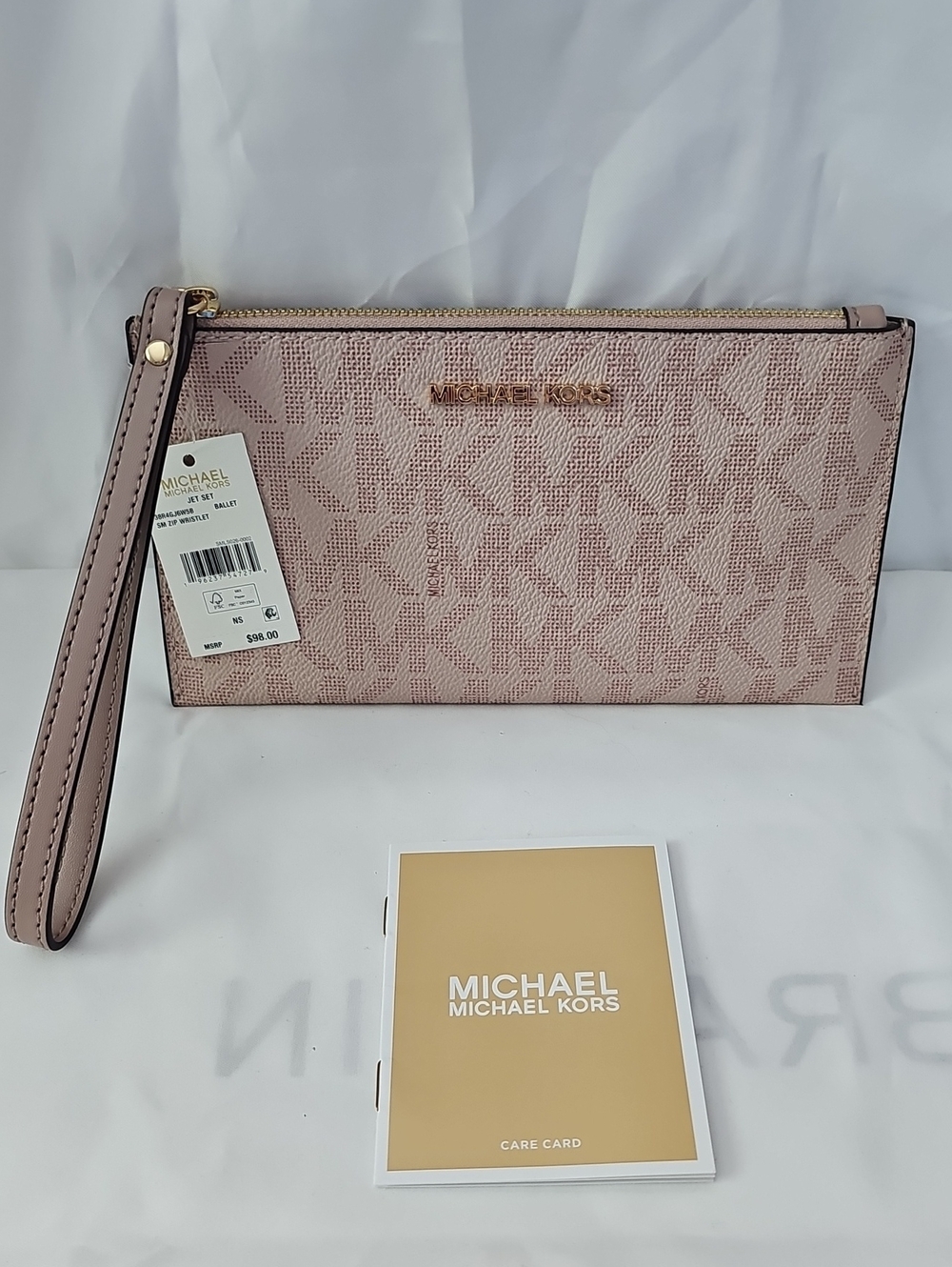 Michael Kors Blush Pink Signature Wristlet with Gold Hardware